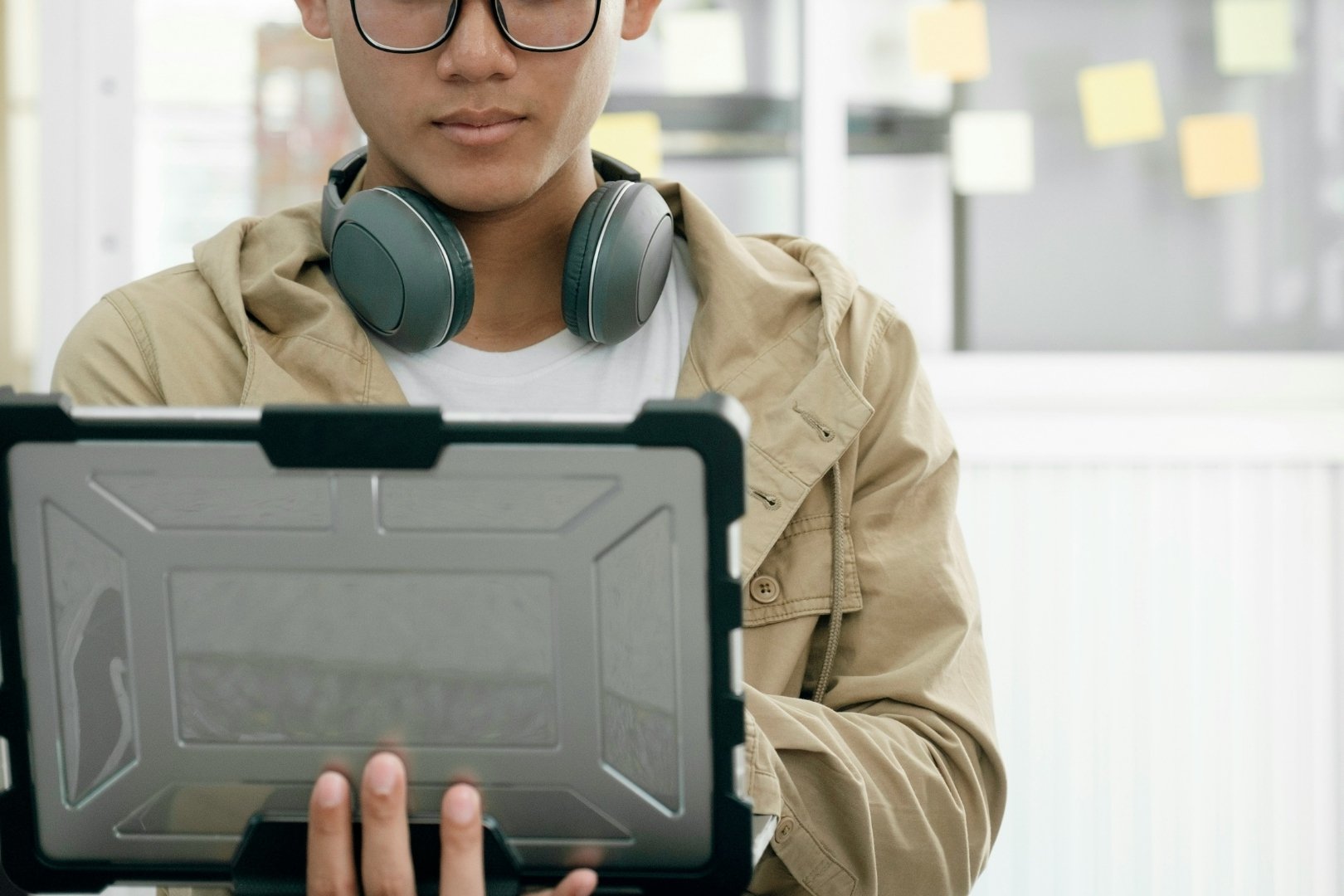 An independent security researcher working with a tablet